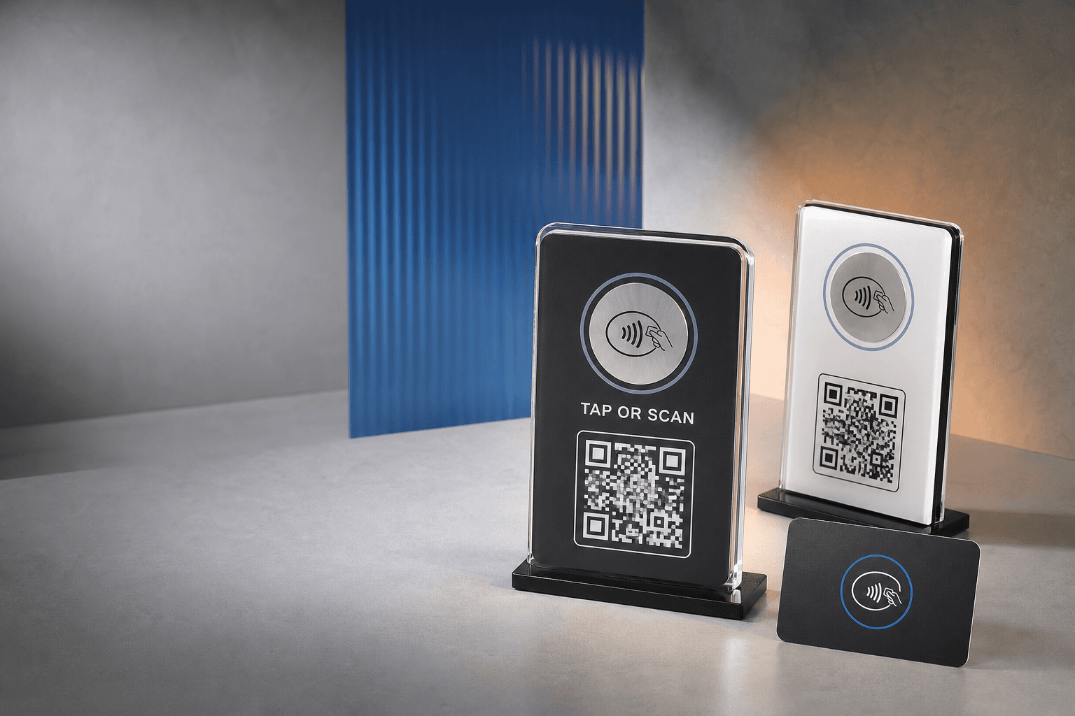 Concept photograph of two NFC and QR feedback stands with a matching NFC card